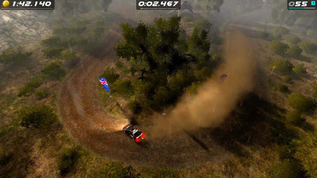 Ένα στιγμιότυπο οθόνης από το παιχνίδι Rush Rally Origins που δείχνει το αυτοκίνητο του παίκτη να κάνει μια γωνία αφήνοντας πίσω του ένα σωρό σκόνης.
